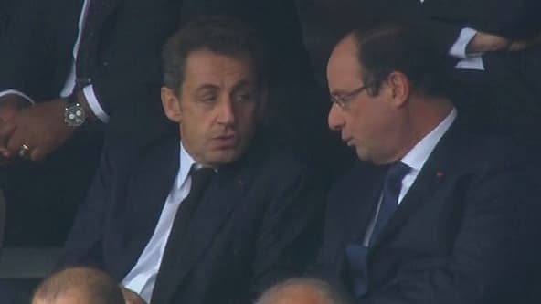 François Hollande et Nicolas Sarkozy, le 10 décembre au Soccer City Stadium de Soweto. François Hollande et Nicolas Sarkozy, le 10 décembre au Soccer City Stadium de Soweto.