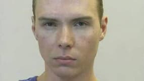 Luka Rocco Magnotta après son arrestation à Berlin, lundi. Les policiers chargés de l'enquête dans l'affaire de ce jeune Canadien soupçonné d'avoir tué et démembré un étudiant chinois, ont été contactés par leurs homologues de Los Angeles, qui enquêtent s