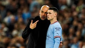 Phil Foden et Pep Guardiola avec Manchester City.