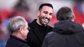 L'ancien défenseur Adil Rami en marge d'un match de Ligue 1 en 2023