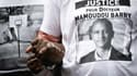Une personne portant un t-shirt "Justice pour Docteur Mamoudou Barry" lors de la marche en hommage à l'universitaire tué dans un crime raciste, le 26 juillet 2019 à Rouen. 