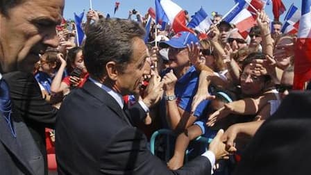 Nicolas Sarkozy à son arrivée à Nouméa. Le chef de l'Etat a exposé samedi sa vision d'une Nouvelle-Calédonie idéale, capable de mobiliser toutes ses composantes avec le soutien de l'Etat français pour mener à bien des projets de développement d'envergure.