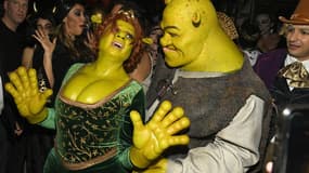 Heidi Klum et Tom Kaulitz, déguisés en Fiona et Shrek pour la fête d'Halloween, le 31 octobre 2018.