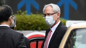L'ancien exécutif de Nissan, Greg Kelly (c) arrive au tribunal à Tokyo, le 15 septembre 2020