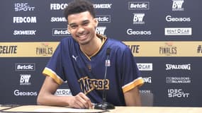 Le fou rire de Victor Wembanyama après avoir failli commettre une gaffe en dévoilant le nom de sa franchise NBA, le 15 juin 2023