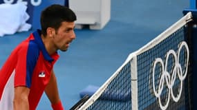 Le Serbe Novak Djokovic, après sa défaite face à l'Espagnol Pablo Correno Busta pour la médaille de bronze, le 31 juillet 2021 aux Jeux Olympiques de Tokyo 2020
