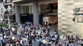 Des personnes se rassemblent à l'extérieur d'un centre commercial à Bangkok le 28 mars 2025, après un tremblement de terre en Birmanie.