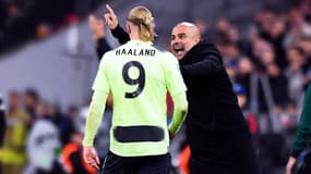 Pep Guardiola et Erling Haaland lors de Bayern-Manchester City (1-1), le 19 avril 2023