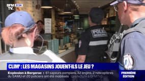A Paris, où un arrêté municipal interdit aux commerçants d'utiliser la climatisation avec les portes ouvertes, les policiers effectuent un travail de sensibilisation 