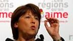 Martine Aubry a déclaré lundi qu'elle ne regrettait rien de son choix de présenter une liste concurrente à celle de Georges Frêche en Languedoc-Roussillon pour les élections régionales. /Photo prise le 14 mars 2010/REUTERS/Pascal Rossignol