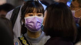 Les habitants de Hong Kong se protègent contre la propagation du coronavirus, le 23 janvier 2020