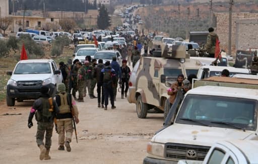 Des combattants rebelles appuyés par l'armée turque se regroupent avant de se diriger vers la ville d'Al-Bab, le 9 février 2017 en Syrie Des combattants rebelles appuyés par l'armée turque se regroupent avant de se diriger vers la ville d'Al-Bab, le 9 février 2017 en Syrie