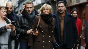 Emmanuel et Brigitte Macron le 1er novembre dernier, en week-end à Honfleur dans le Calvados. - CHARLY TRIBALLEAU / AFP