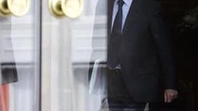 Selon le secrétaire général de l'Elysée, Claude Guéant, Nicolas Sarkozy devrait nommer un gouvernement "plus resserré" lors du remaniement qui aura lieu après l'adoption de la réforme des retraites. /Photo prise le 24 mars 2010/REUTERS/Vincent Kessler