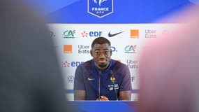 Youssouf Fofana tout sourire en conférence de presse, le 7 juillet 2024