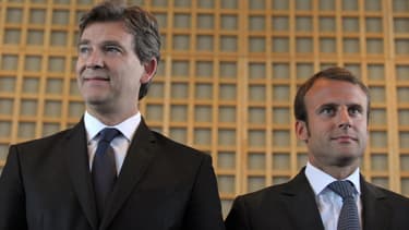 Arnaud Montebourg et Emmanuel Macron, lors de la passation de pouvoir à Bercy.