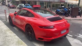 Une Porsche 911 Carrera de l'auto-école monégasque "Monaco Bonne Conduite", le 2 avril 2025.