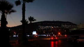 Sur la place des Omeyyades, à Damas, à la tombée de la nuit. Le sort de Bachar al Assad restait inconnu jeudi au lendemain d'un attentat ayant frappé son régime au coeur de la capitale syrienne, théâtre des combats les plus intenses en 16 mois de soulèvem