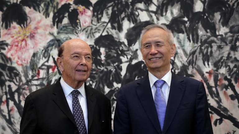 Le vice-Premier ministre chinois Liu He et le secrétaire américain au Commerce Wilbur Ross en juin dernier, à Pékin.