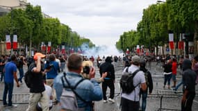 Des manifestants sur les Champs-Elysées le 14 juillet 2019