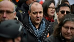 Le secrétaire général de la CFDT Laurent Berger (C), le 28 mars 2023 lors d'une manifestation contre la réforme des retraites à Paris