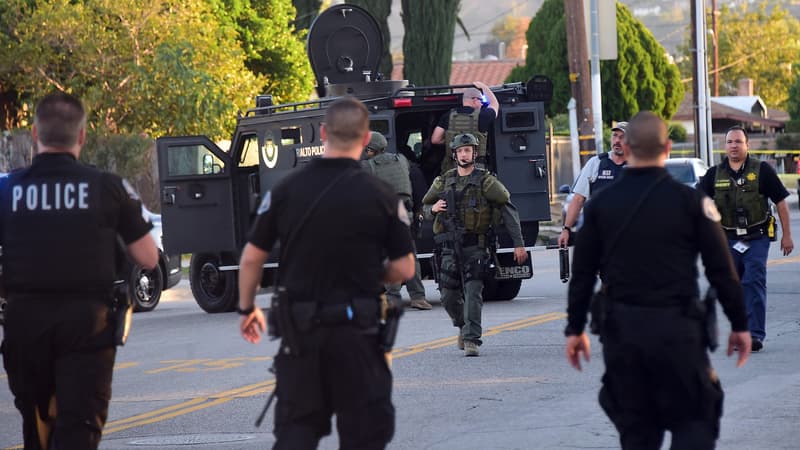 Des forces de l'ordre sur les lieux de la fusillade, à San Bernardino, en Californie, le 2 décembre.