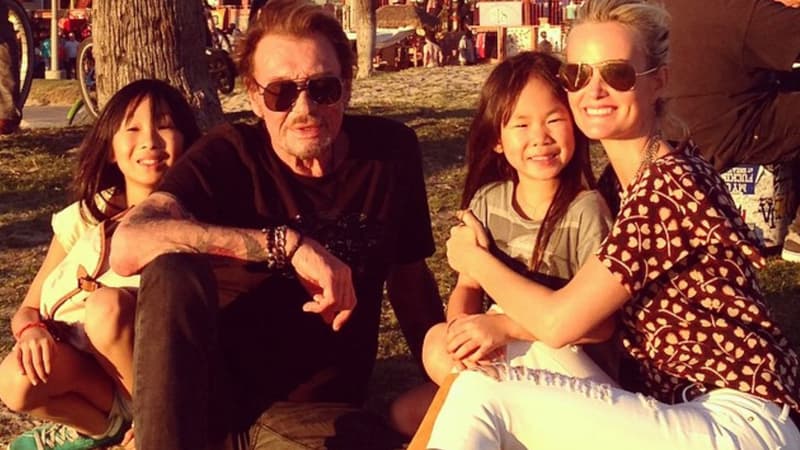 Johnny et Laeticia Hallyday au côté de leurs filles Jade et Joy.