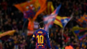 La joie des supporters barcelonais après un but de l'attaquant argentin Lionel Messi, lors du match de Liga contre le Celta Vigo, le 9 août 2019 au Camp Nou