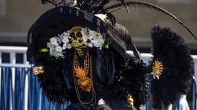 Une personne déguisé lors de la Fête des morts à Mexico, le 31 octobre 2021