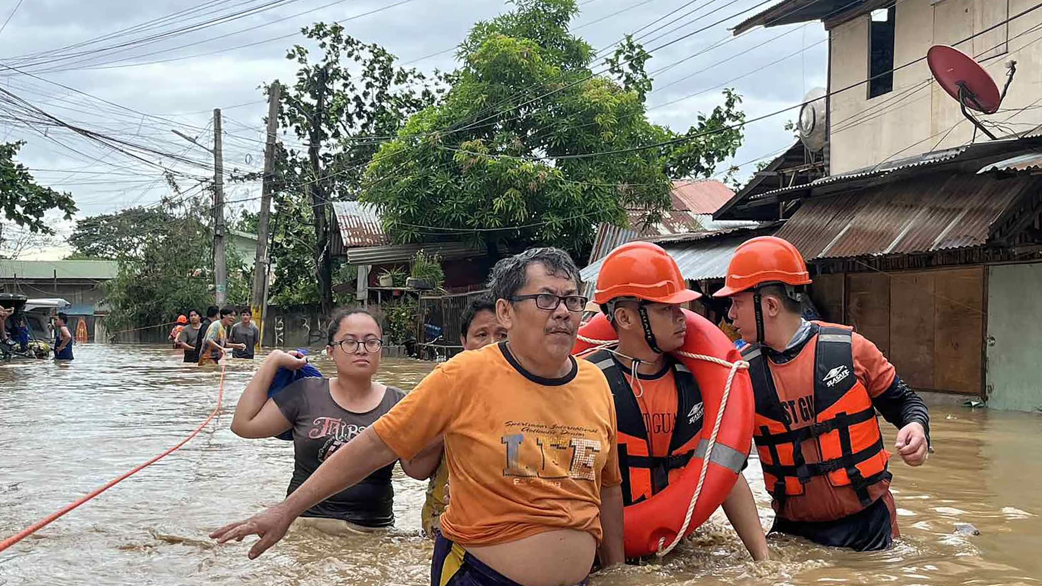 Coast guards evacuate residents after Typhoon Kalmaegi hits Cebu province, Philippines, Nov. 4, 2025.