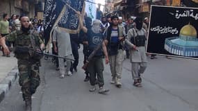 Des combattants islamistes du Front al-Nosra, à Damas en Syrie, le 28 juillet 2014.