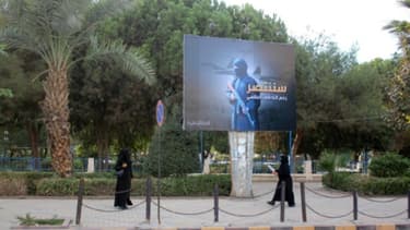Des femmes en niqab dans la ville syrienne de Raqa en 2014, alors occupée par le groupe Etat islamique