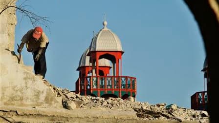 Chantier en cours à Port-au-Prince. Haïti a entamé mardi les commémorations du premier anniversaire du séisme du 12 janvier 2010, l'une des plus grandes catastrophes urbaines de l'histoire qui a fait 250.000 morts, 300.000 blessés et un million et demi de