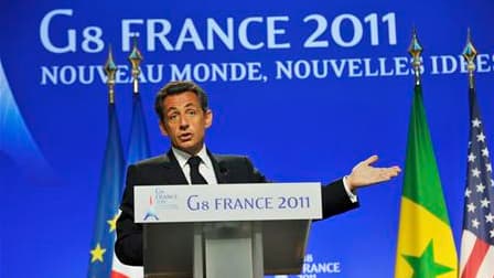 A Deauville, Nicolas Sarkozy a confirmé un plan d'aide du G8 de 40 milliards de dollars en faveur des pays du "printemps arabe". /Photo prise le 27 mai 2011/ REUTERS/Philippe Wojazer
