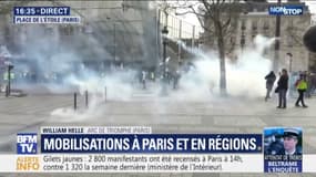 Gilets jaunes: premiers tirs de gaz lacrymogènes en haut des Champs-Élysées