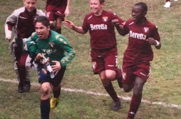 Moise Kean (à droite) lorsqu'il évoluait avec le Torino dans son enfance