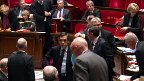 Les membres du gouvernement, à l'invite de François Fillon, ont quitté mardi l'hémicycle de l'Assemblée nationale après qu'un député socialiste eut comparé les propos de Claude Guéant sur les civilisations à l'idéologie nazie. /Photo prise le 7 février 20