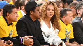 Jay-Z et son épouse Beyonce à un match des Jets Brooklyn, l'équipe dont il est fan. 