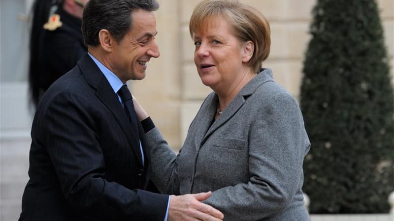 Selon Nicolas Sarkozy, si Angela Merkel vient en France avant l'élection présidentielle, ce sera pour parler Europe et non pour participer à une réunion électorale de l'UMP. /Photo prise le 6 février 2012/REUTERS/Philippe Wojazer
