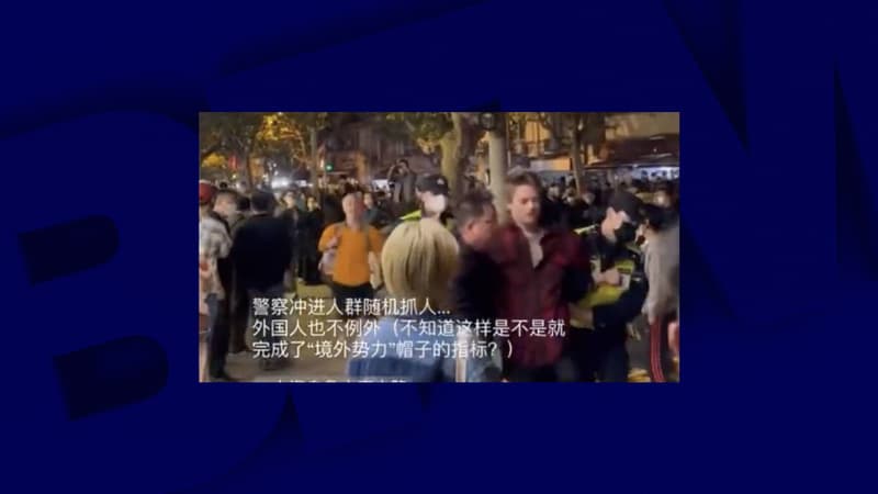 Le journaliste de la BBC Ed Lawrence, lors de son arrestation par la police chinoise à Shanghai