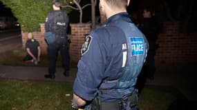 La police australienne se met en place le 18 septembre 2014 pour la plus vaste opération antiterroriste organisée dans ce pays.