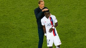 Thomas Tuchel et Idrissa Gueye lors de PSG-Real Madrid en Ligue des champions, au Parc des Princes le 18 septembre 2019