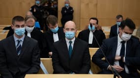 Trois des sept militaires, jugés pour homicide involontaire pour la mort par noyade du sous-lieutenant Jallal Hami en 2012 lors d'une soirée d'intégration à l'école de Saint-Cyr Coëtquidan, devant le tribunal correctionnel de Rennes, le 23 novembre 2020
