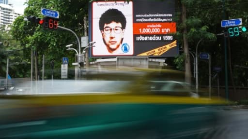 Panneau électronique montrant le le portrait robot d'un des suspects auteur de l'attentat de Bangkok qui a fait 20 morts mi-août dans la capitale thaïlandaise