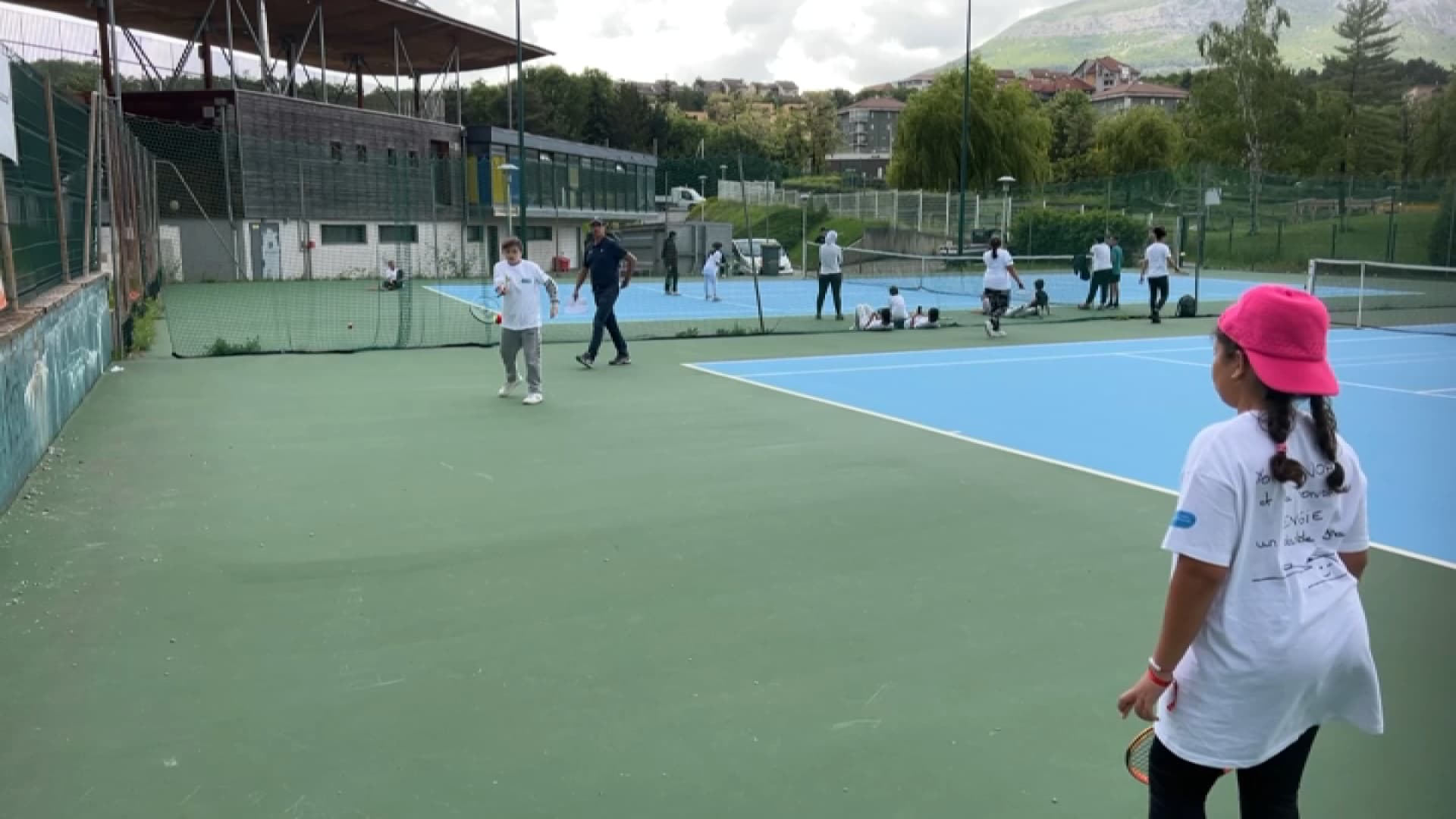 a tennis tournament with local youngsters from the working-class districts