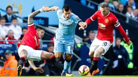 Sergio Aguero et Wayne Rooney