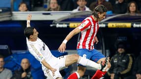 Filipe Luis et Angel Di Maria lors d'un Real-Atlético de Madrid en 2011.