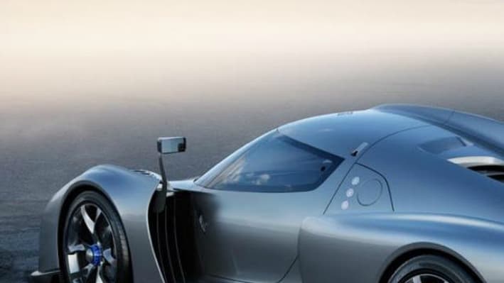 La ressemblance avec la Ferrari Enzo n'est pas totalement une coïncidence: James Glieckenhaus est un milliardaire américain, grand passionné d’automobile, connu pour avoir d'abord créé avec Pininfarina la P4/5, une sorte de remix de la Ferrari Enzo. La ressemblance avec la Ferrari Enzo n'est pas totalement une coïncidence: James Glieckenhaus est un milliardaire américain, grand passionné d’automobile, connu pour avoir d'abord créé avec Pininfarina la P4/5, une sorte de remix de la Ferrari Enzo.