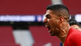 L'attaquant uruguayen de l'Atlético de Madrid, Luis Suarez, exulte après son but lors du match de Liga à domicile contre Osasuna, le 16 mai 2021.