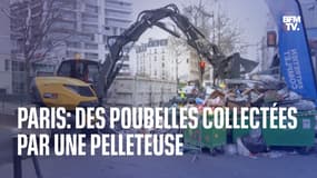 À Paris, des poubelles entassées dans les rues sont collectées par une pelleteuse